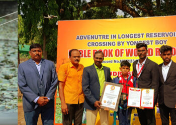 12 y.o. boy Crosses 337 Ft Reservoir in 7 minutes! sets world record